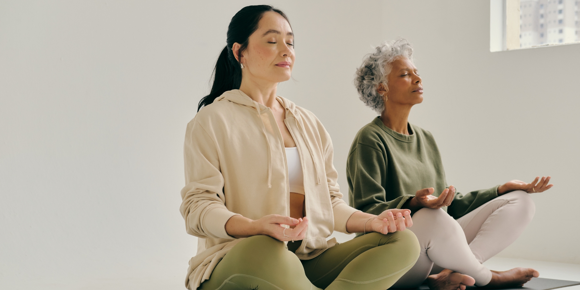 Nature Mandala and Mindful Movement workshops in Esperance with Carers WA banner. The banner consists of an image of two women meditating in a cream coloured room.