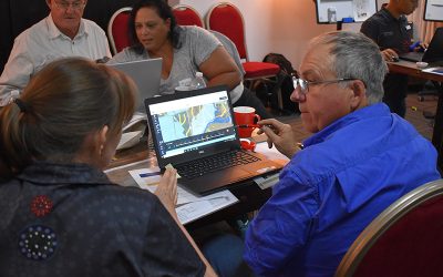 Pictured are (back), Bob Harris, of Glencoe, and Kylie Jones of the Department of Resources, and (front) with backs facing camera, Maree Cali, of the Department of Resources, and Graham Gordon, of Two Mile.