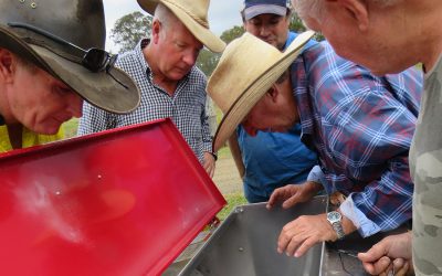 Eungella-Crediton cluster group members inspect their new lime dropper.