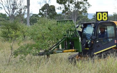 Barry O'Sullivan, Glenalpine Station, demonstrates a tree puller that grabs hold of small trees then pulls them up and out completely, roots and all. Landholders indicated due to the powerful pulling performance of the attachment, they can clear large areas effectively, or use for more selective removal of saplings.