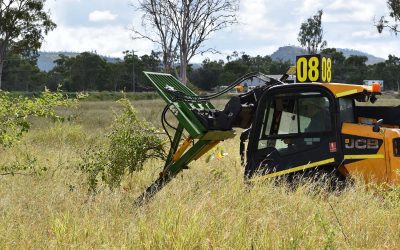Barry O'Sullivan, Glenalpine Station, demonstrates a tree puller that grabs hold of small trees then pulls them up and out completely, roots and all. Landholders indicated due to the powerful pulling performance of the attachment, they can clear large areas effectively, or use for more selective removal of saplings.