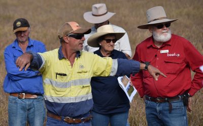 Barry Collett, at front, a member of the Scottville Cluster Group, explains erosion control works he carried out on Todsure. He is pictured with, from left, Carl Groocock, Three Mile, NQ Dry Tropic's Dan Hazelman, Isabel Sloan, Hillview, and DAF's Bob Shepherd.