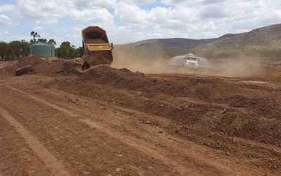 Initial earthworks at the Glen Bowen gully remediation site includes reshaping the complex gully network to form two stabilised free-draining basins.
