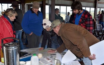 Studying maps of the Upper Broken River catchment, from left, Many Tennent, Dale Fortescue, Kim-marie Kliese and Paul Tippett.