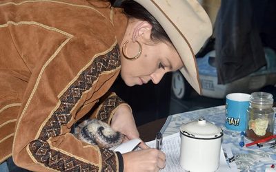 Shanara Paton signs in for the workshop.