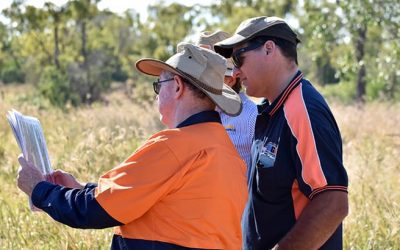 Verterra's Peter Wilkinson and LDC project panel member and grazier Buster O'Loughlin review maps of works undertaken at Mt Wickham.