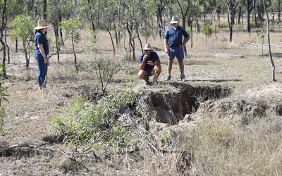 Exevale Station owner Buster O'Loughlin shows LDC acting landscape remediation officer Sheyanne Frisby erosion features he is hoping can be remediated through extension.