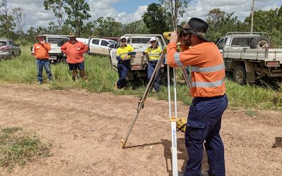 Dan Waite Aurizon sights through the dumpy level watched by (from left) WRC staffers Garry Reeves and Lindsay Mackie, and Glencore workers Patrick Curtis and Jess Szalinski