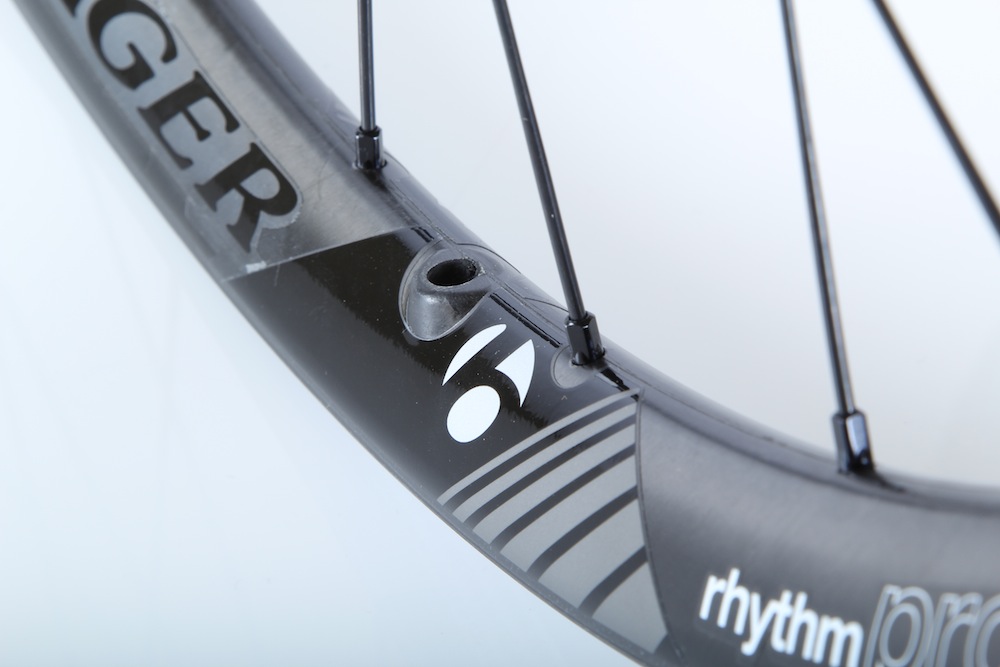 The rim is offset, to reduce wheel dish and allow more consistent spoke tension.