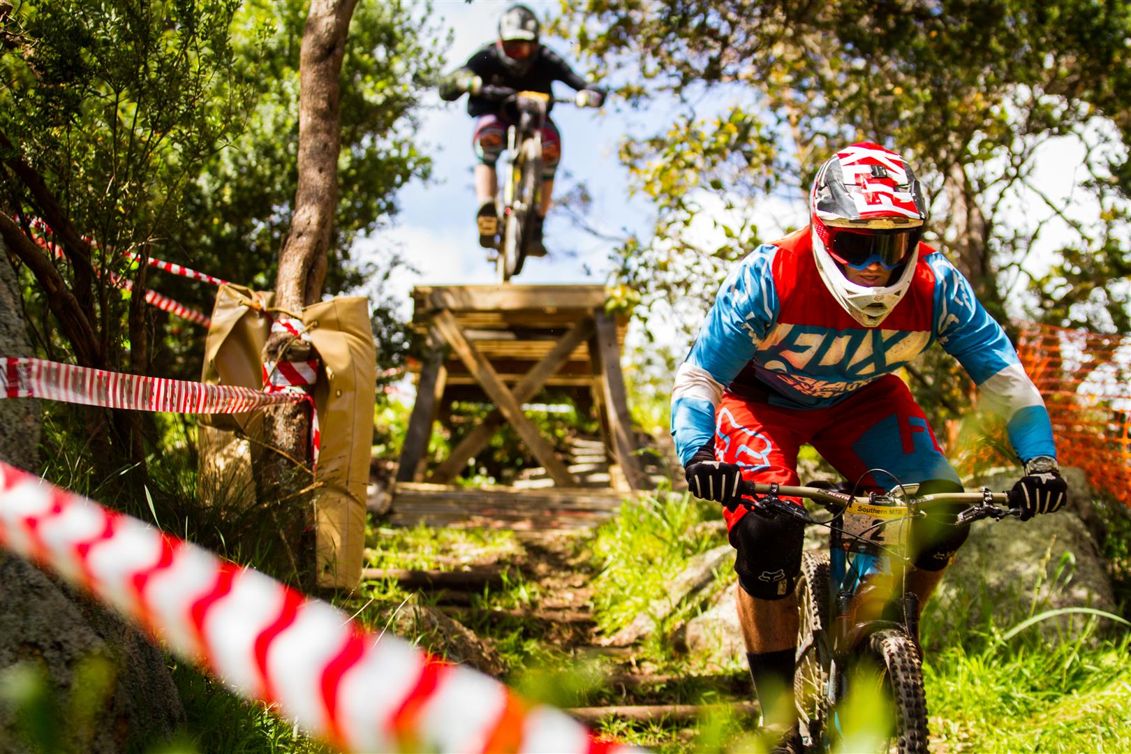 Downhill winner Jordan Prochyra being chased through the neighbourhood.