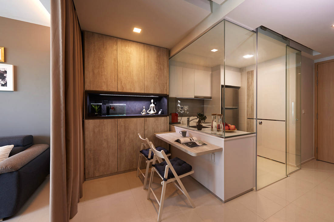 This petite apartment efficiently uses the space (or lack thereof) for living and storage