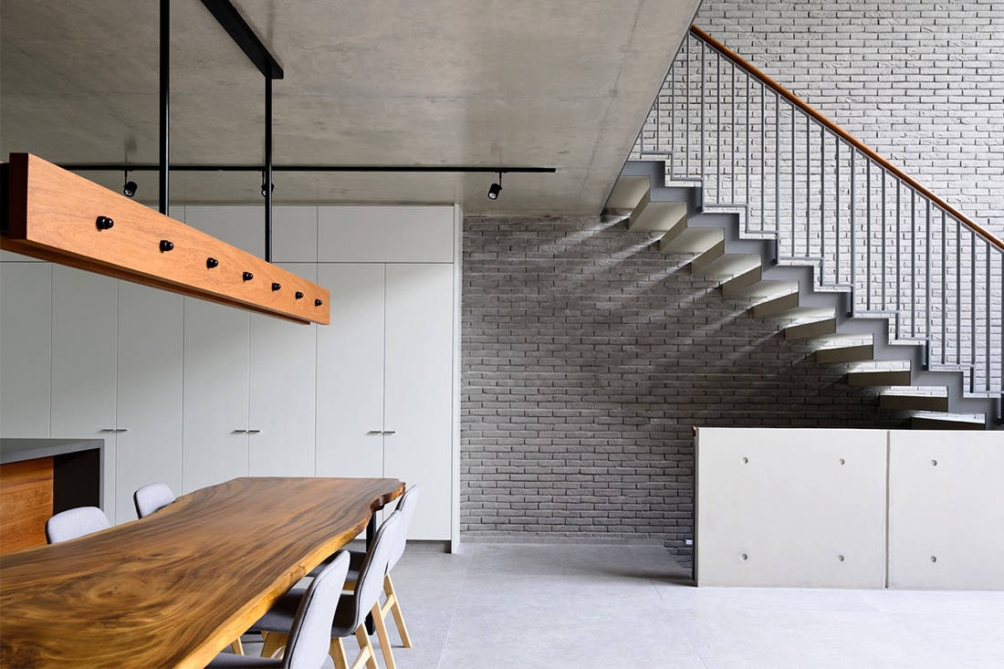 An inter-terrace house dressed in bricks