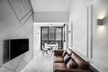 Brass details give this condo a visual boost in size and aesthetics