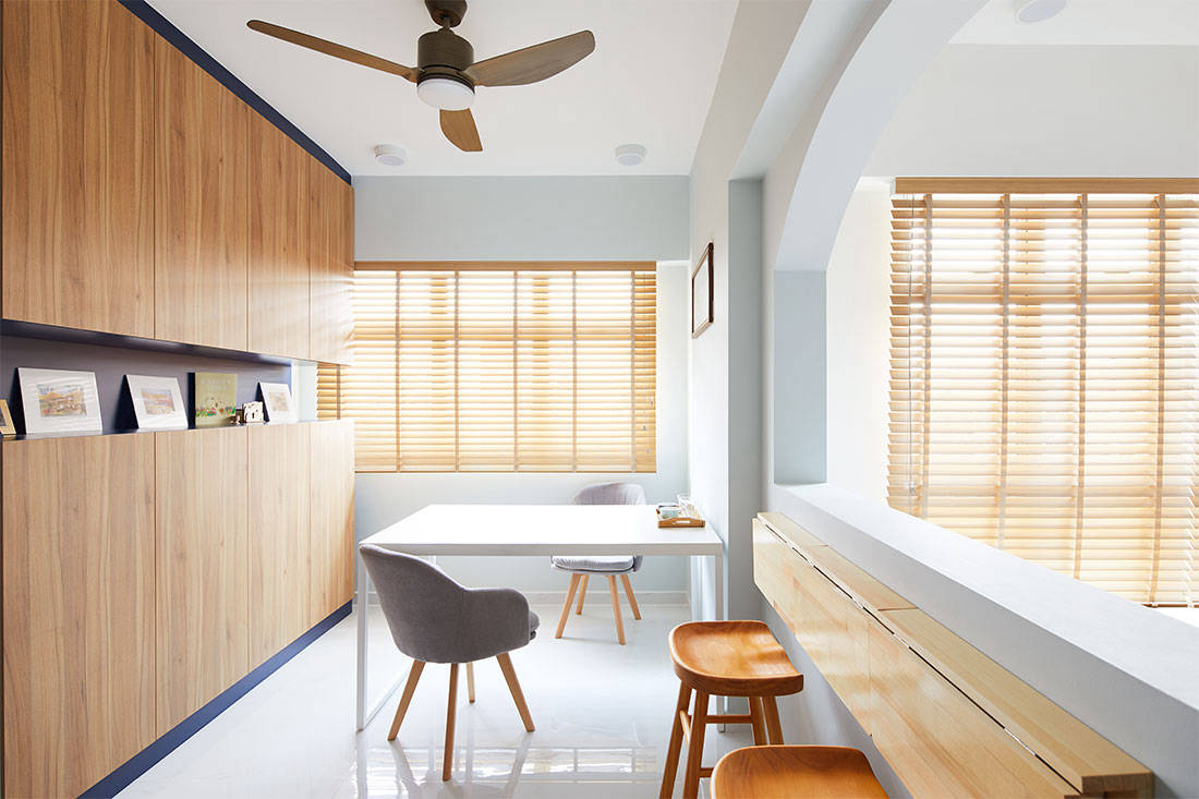 An HDB flat with archways and a tranquil vibe