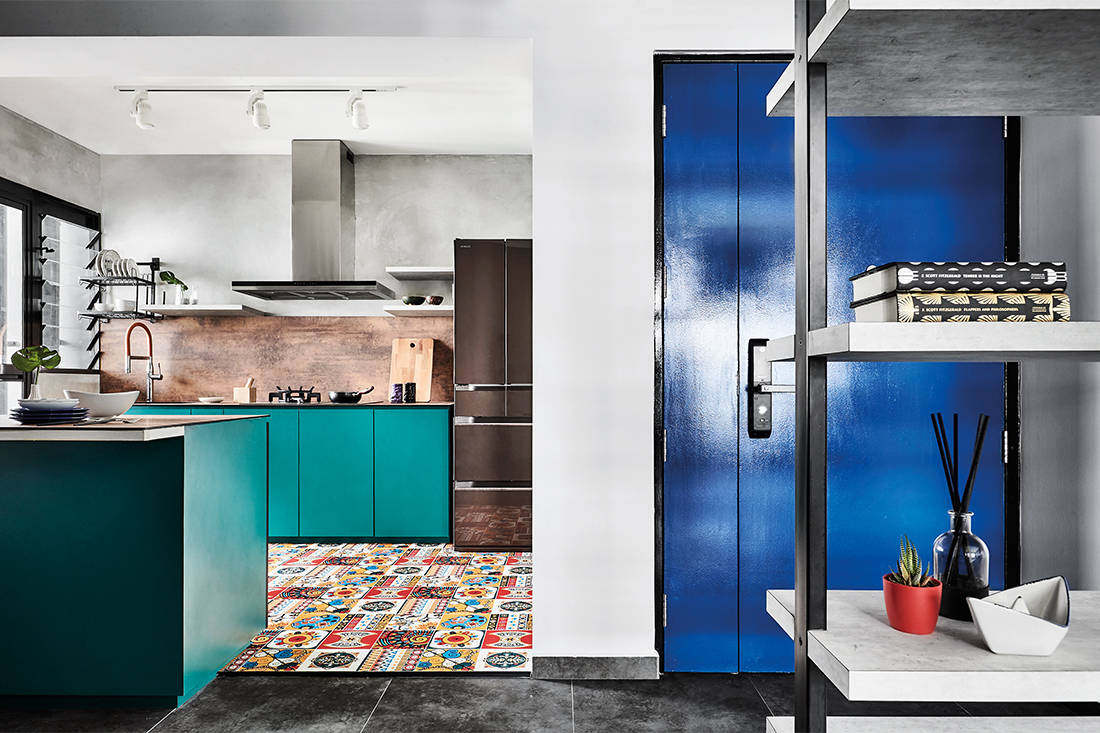 The effective use of bold colours and patterns to inject a fun vibe in this flat