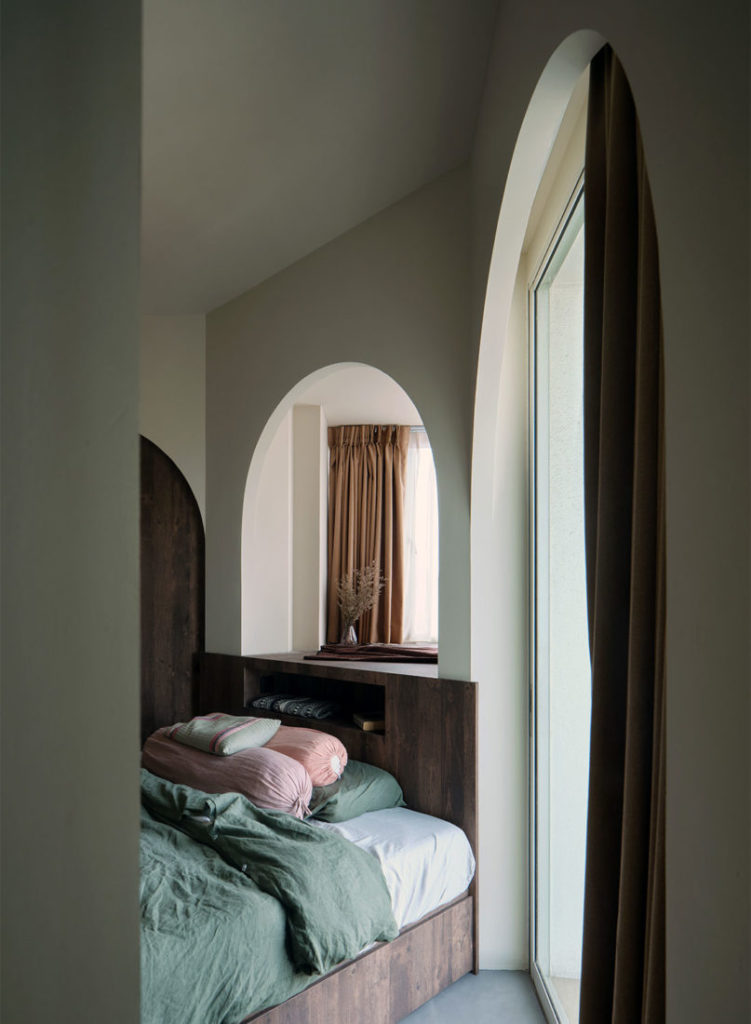 bedroom with arch