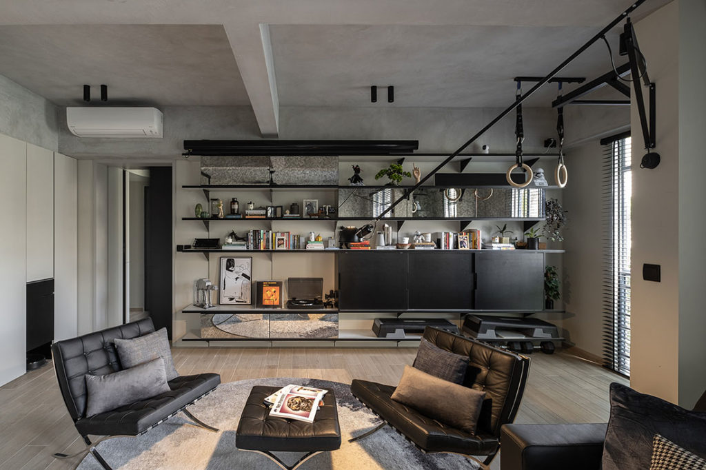 apartment with exercise equipment on ceiling