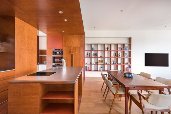 A host-ready home with terracotta warmth and hidden doors