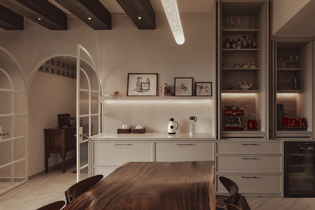 A condo reoriented around books and nature