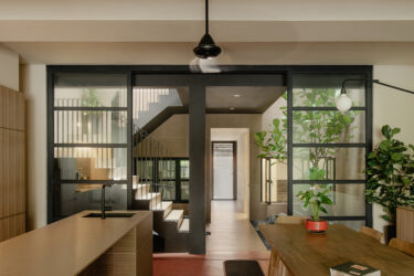 A family home defined by its giant roof