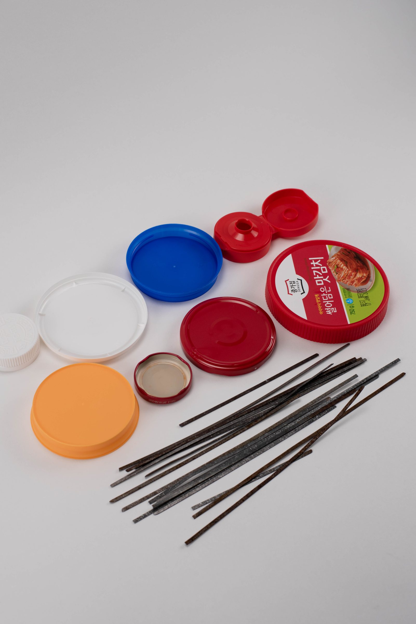 container lids and found street sweeper bristles