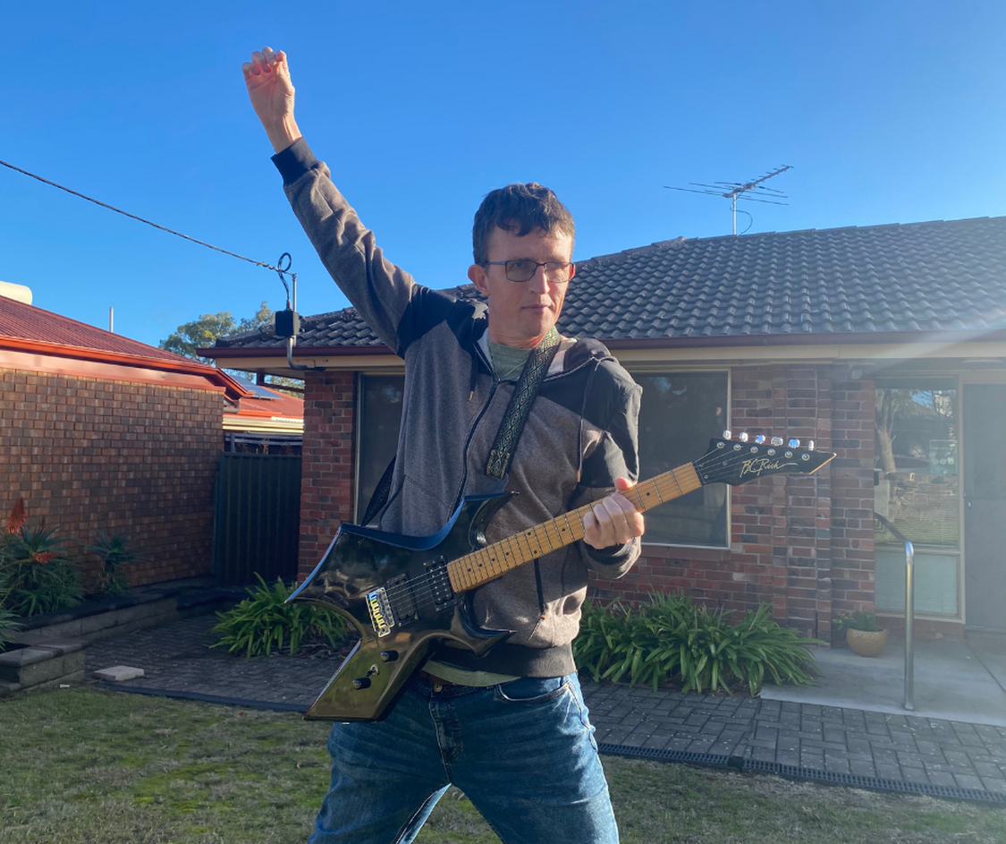 Ryan Playing the Guitar