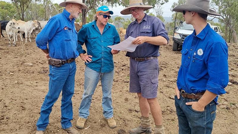Four graziers discuss sustainable grazing practices at one of the Dick Richardson "neighbour days".