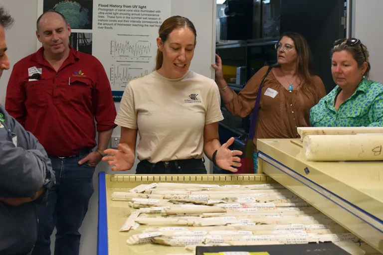 Dr Kay Davis explaining coral cores to the group.