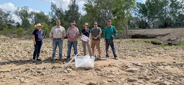 Community Water Quality Sampling group members receive some training from JCU TropWATER scientists Zoe Bainbridge and Steve Lewis.