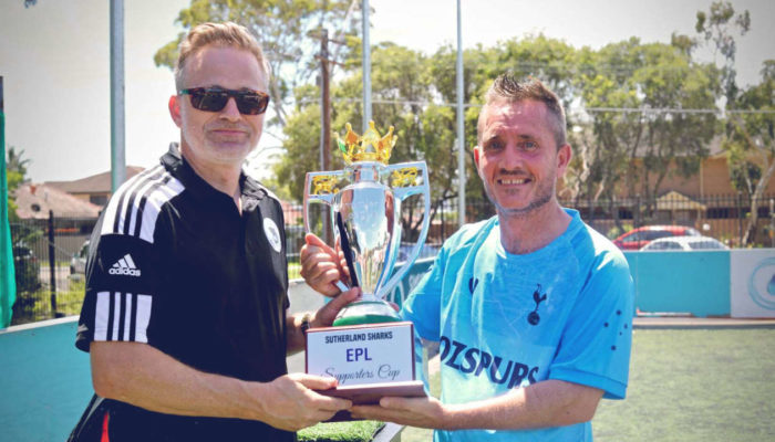 Paf receives the EPL Supporters Cup trophy