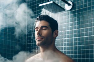man enjoying hot water shower