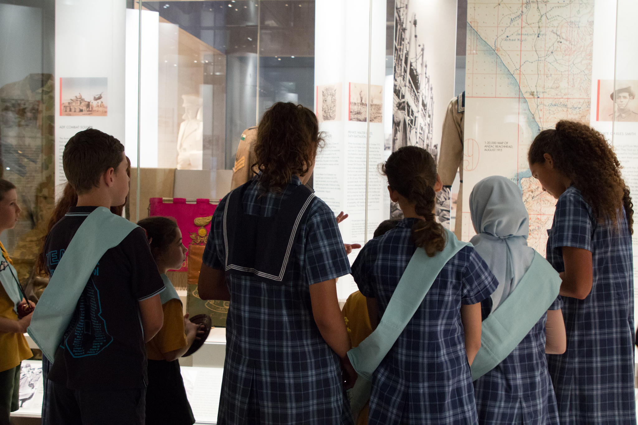 Stage 3 students viewing exhibition in the Centenary Extension