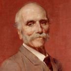 Oil painting portrait of a smiling bald man with grey moustache, wearing a tan suit.