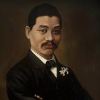 Oil portrait of a Chinese man with moustache, wearing a fine suit and an elaborate lapel pin.