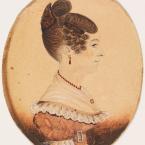 Miniature portrait of a person with an elaborate hairstyle