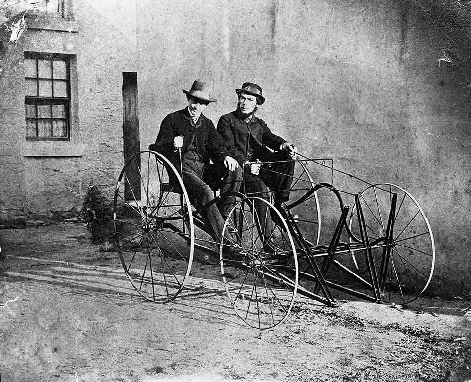  Norman Selfe (with beard) and Edmund Wolstenhome on velocipede invented by Selfe c1870s, courtesy of the Deer Family