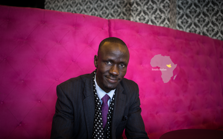 Image of Deng, with a map of South Sudan superimposed.