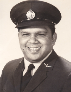 A black and white photographic portrait of young Harry Allie