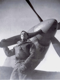 John pictured with a Spitfire
