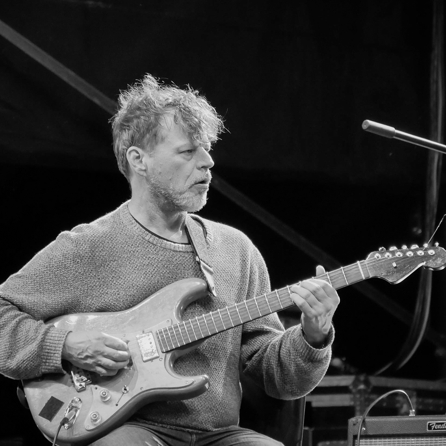 Stephen Magnussum plays guitar