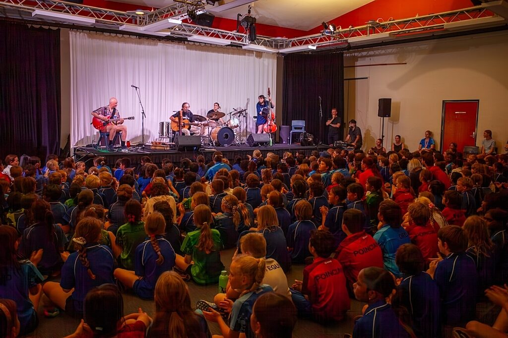Header image caption Wanim artists perform at East Kimberley College in Kununurra Image by Max Mackenzie