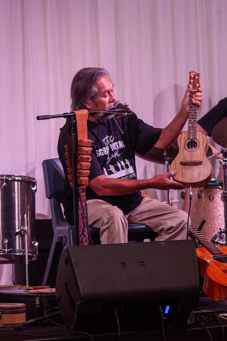 Stephen Pigram shows the ukulele made from mango tree in his nannys backyard Image by Max Mackenzie